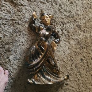 It's a porcelain sculpture. I believe India.